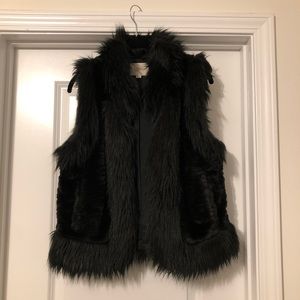 Black faux fur vest